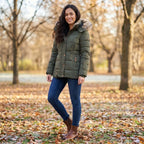 Close up view of the Womens Fitted Winter Puffer Jacket showing its sleek fabric texture, precise stitching, and modern design details against a neutral background.