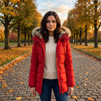 Close up view of the Womens Fitted Winter Puffer Jacket showing the sleek fabric texture and detailed stitching against a soft neutral background.