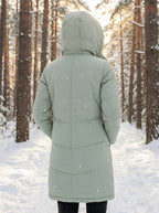 Close up view of the women's flattering quilted winter puffer jacket showing intricate stitching and luxurious fabric texture in a neutral color.