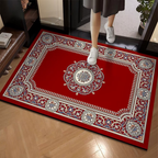 Decorative red rug with intricate patterns on a wooden floor, person stepping onto it.