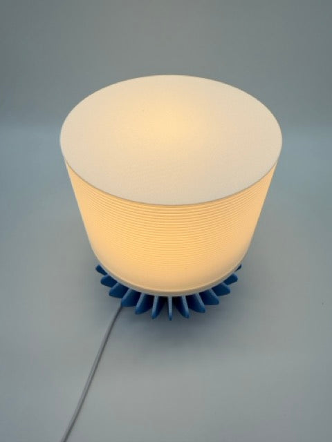 Geo Modern Table Lamp with Blue Geometric Base and White Ribbed Shade – Ambient Lighting