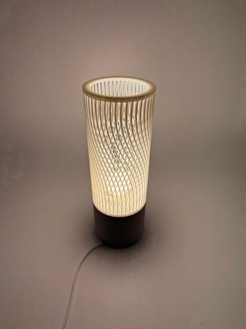 Spiral Modern Table Lamp with Openwork Cylinder Design and Grey Base – Stylish Ambient Lighting