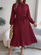 Women's Maxi Dress with Pleated Skirt and Waist Belt - High Neck, Long Sleeve