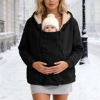 Black plush zip-up babywearing fleece sweatshirt coat, front view with baby in pouch