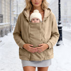 Beige plush zip-up babywearing fleece sweatshirt coat, front view with baby in pouch