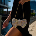 Elegant clutch bag in a soft fabric, featuring intricate detailing and sleek silhouette, shown — view 6 — view 6