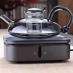 glass teapot set with cups in gray