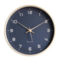 Nordic Wooden Wall Clock with navy face and beige wooden bezel, shown on a plain white background in product photography.