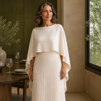 long wedding guest dress — Beige wedding guest dress boat neckline cape and pleat detail — view 6