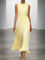 Sleeveless ruched A-line maxi dress in pale yellow, front view